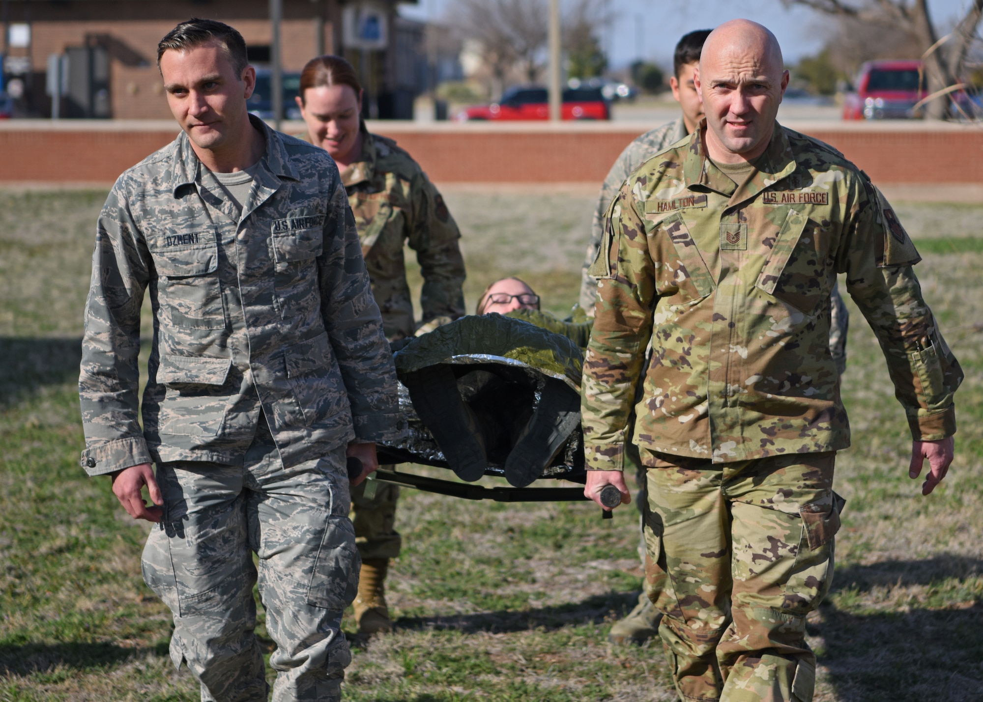 U.S. Air Force medics with the 17th Medical Group carry a simulated casualty on a stretcher during the Tactical Combat Casualty Care course at Goodfellow Air Force Base, Texas, Feb. 21, 2020. The TCCC training consists of two intensive days both in and out of the classroom. (U.S. Air Force photo by Airman 1st Class Ethan Sherwood)