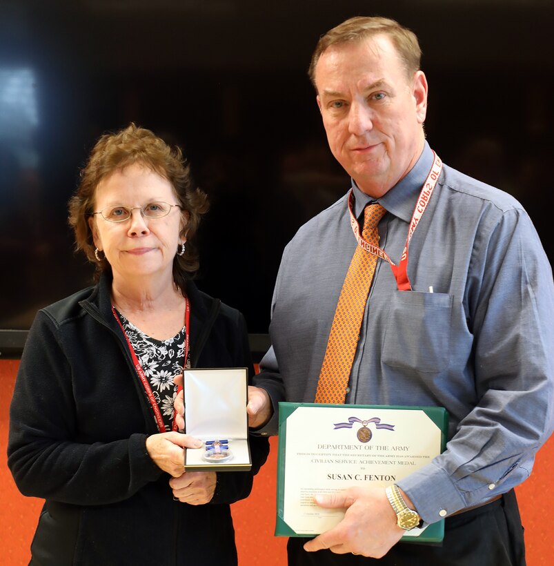 Susan Fenton receives a Civilian Service Achievement Medal.