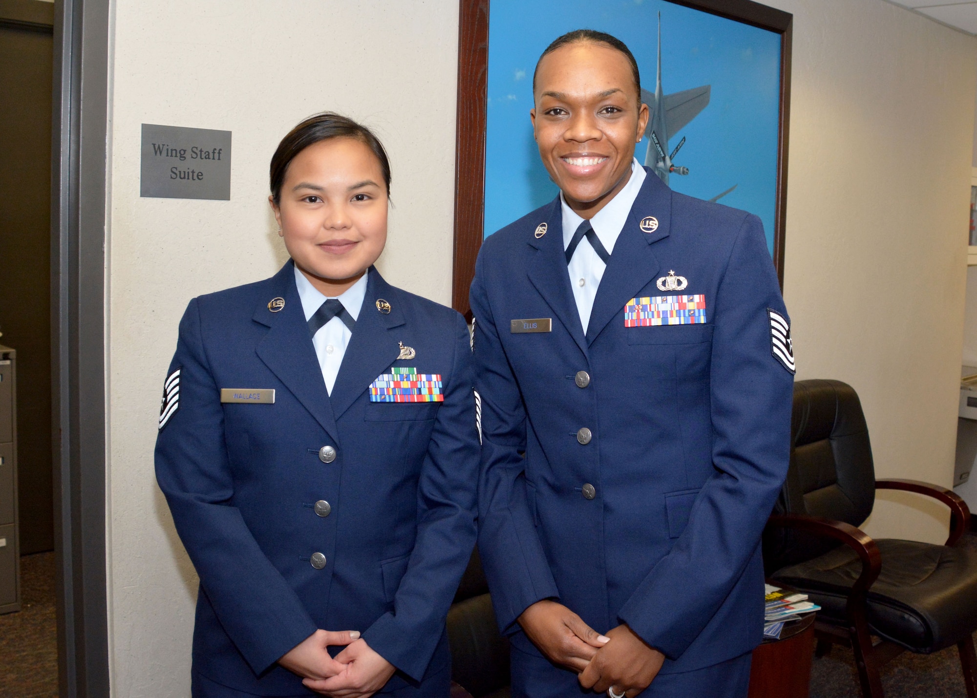 Two Airmen at the commissioning board