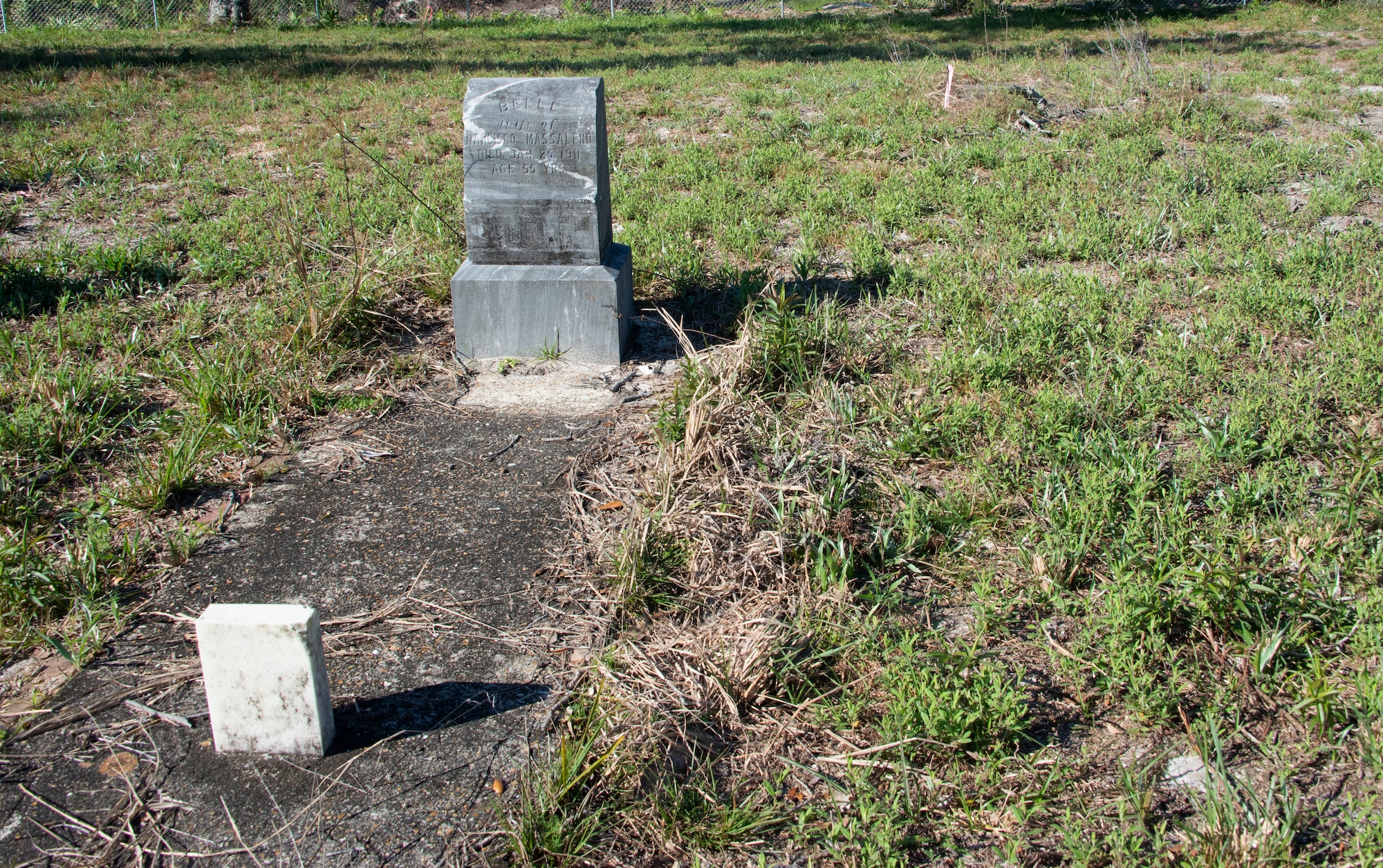 Pictured is one of the few marked graves in Massalina Cemetery at Tyndall Air Force Base, Florida, Feb. 28, 2020. Belle Massalina was buried in 1911. (U.S. Air Force photo by 2nd Lt. Kayla Fitzgerald)