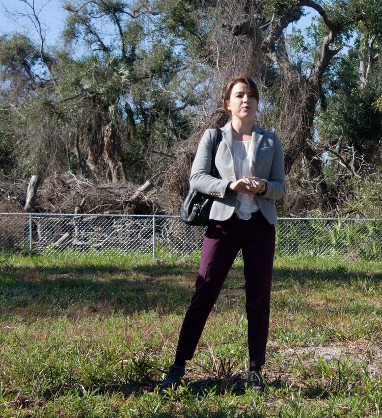 Ilaria Harrach, Air Force Civil Engineer Center cultural resources program manager, speaks to member of the media about the history of Massalina Cemetery at Tyndall Air Force Base, Florida, Feb. 28, 2020.  Massalina Cemetery is one of 11 cemeteries location on Tyndall AFB property. (U.S. Air Force photo by 2nd Lt. Kayla Fitzgerald)