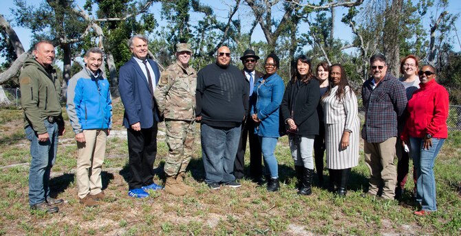 Subject matter experts pose for a group photo during a press event at Tyndall Air Force Base, Florida, Feb. 28, 2020. The press event was held to inform the public of Tyndall’s ongoing stewardship of cemeteries located on base land. (U.S. Air Force photo by 2nd Lt. Kayla Fitzgerald)