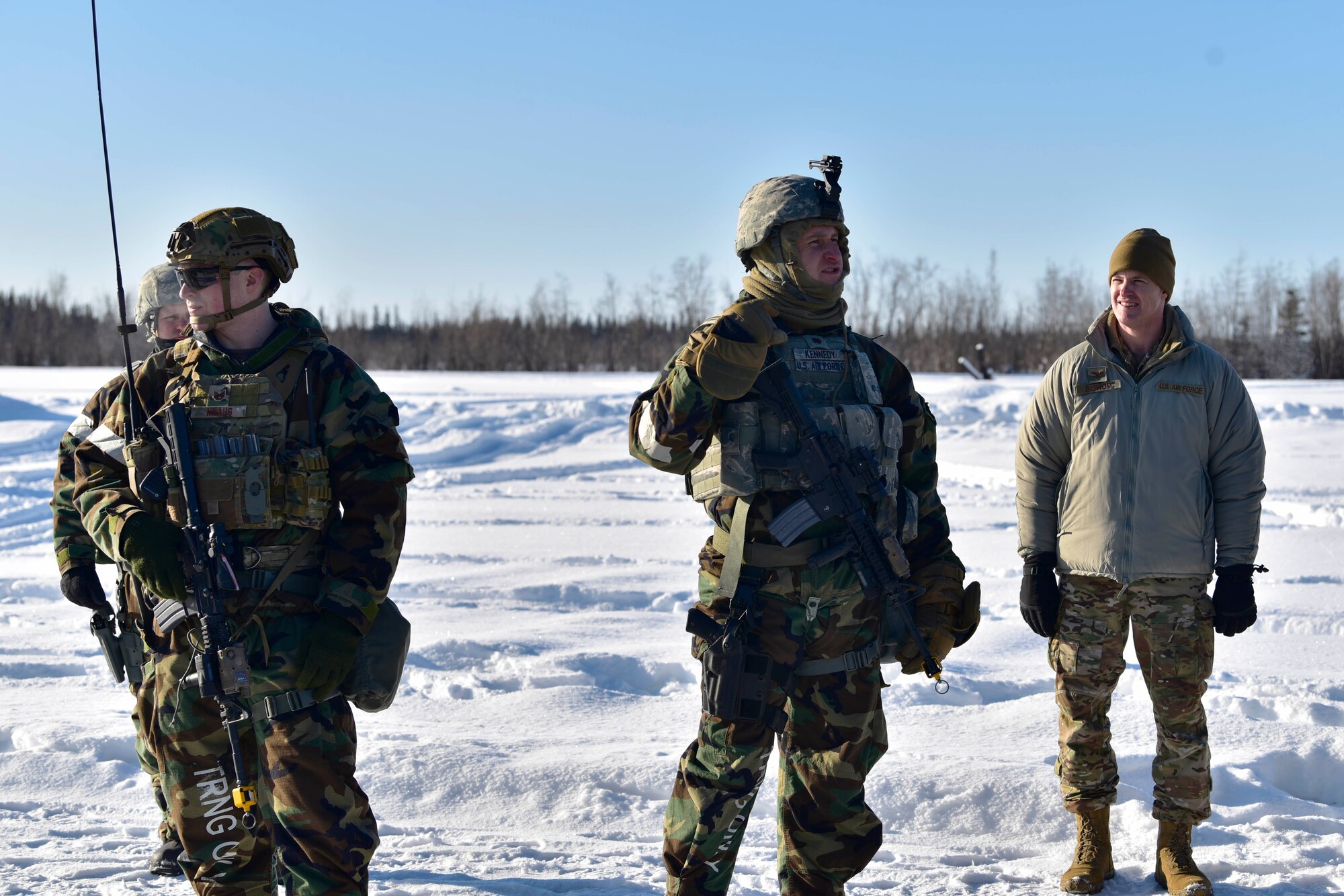 U.S. Air Force Maj. Michael Kennedy, 354th Security Forces Squadron (SFS) commander, addresses Airmen assigned to the 354th SFS during a medical evacuation (MEDEVAC) exercise on Eielson Air Force Base, Alaska, Feb. 26, 2020. The MEDEVAC exercise was designed to train defenders on how to properly call in a helicopter in the event of a casualty. (U.S. Air Force photo by Senior Airman Beaux Hebert)
