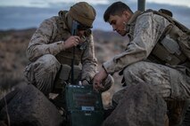 U.S. Marines operate a radio during a Regimental Assault Course (RAC), Marine Air Ground Combat Center, Twentynine Palms, California, Feb. 11, 2020. Marines with 1st Battalion, 3rd Marine Regiment participating in integrated training exercise (ITX) 2-20, conducted a Marine Corps Combat Readiness Evaluation (MCREE), along with various other training events to prepare Marines for deployment. (U.S. Marine Corps photo by Lance Cpl. Jose Angeles)