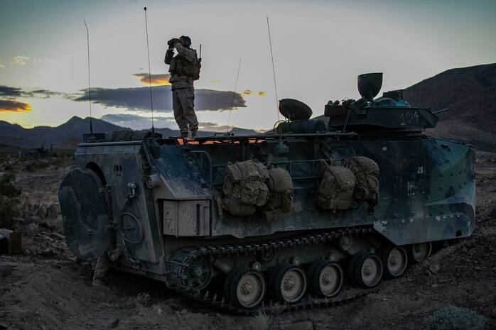 A U.S. Marine overlooks the training ground during a Regimental Assault Course (RAC), Marine Air Ground Combat Center, Twentynine Palms, California, Feb. 11, 2020. Marines with 1st Battalion, 3rd Marine Regiment participating in integrated training exercise (ITX) 2-20, conducted a Marine Corps Combat Readiness Evaluation (MCREE), along with various other training events to prepare Marines for deployment. (U.S. Marine Corps photo by Lance Cpl. Jose Angeles)