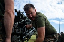 U.S. Marine Corps Sgt. Cody Kerr, cannoneer, Bravo Battery, 1st Battalion, 12th Marine Regiment participates in a relay race during the St. Barbara’s day field meet, Marine Corps Base Hawaii, Feb. 27, 2020. The St. Barbara’s day field meet is an annual celebration in honor of St. Barbara, the patron saint of artillery, to build camaraderie and friendly competition within the unit. The celebration consists of relay races, a trebuchet competition, and a High Mobility Multipurpose Wheeled Vehicle push. (U.S. Marine Corps photo by Lance Cpl. Samantha Sanchez)