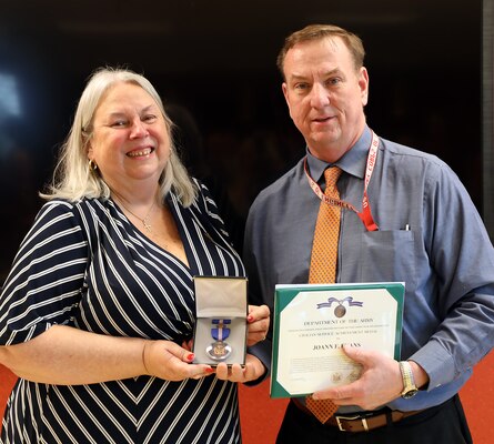 Jo-Ann Evans receives a Civilian Service Achievement Medal.