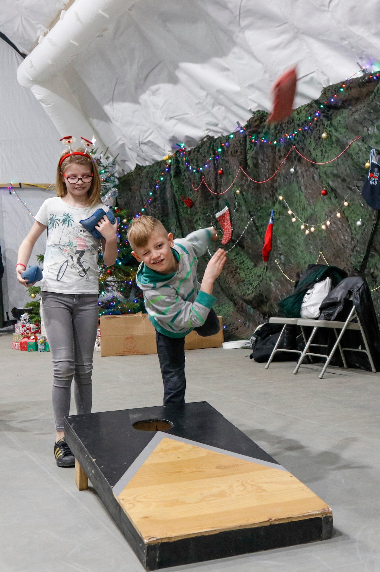 NATO Soldiers give local children holiday cheer during “Operation Christmas”