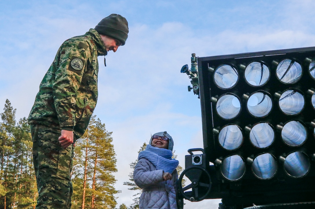 NATO Soldiers give local children holiday cheer during “Operation Christmas”