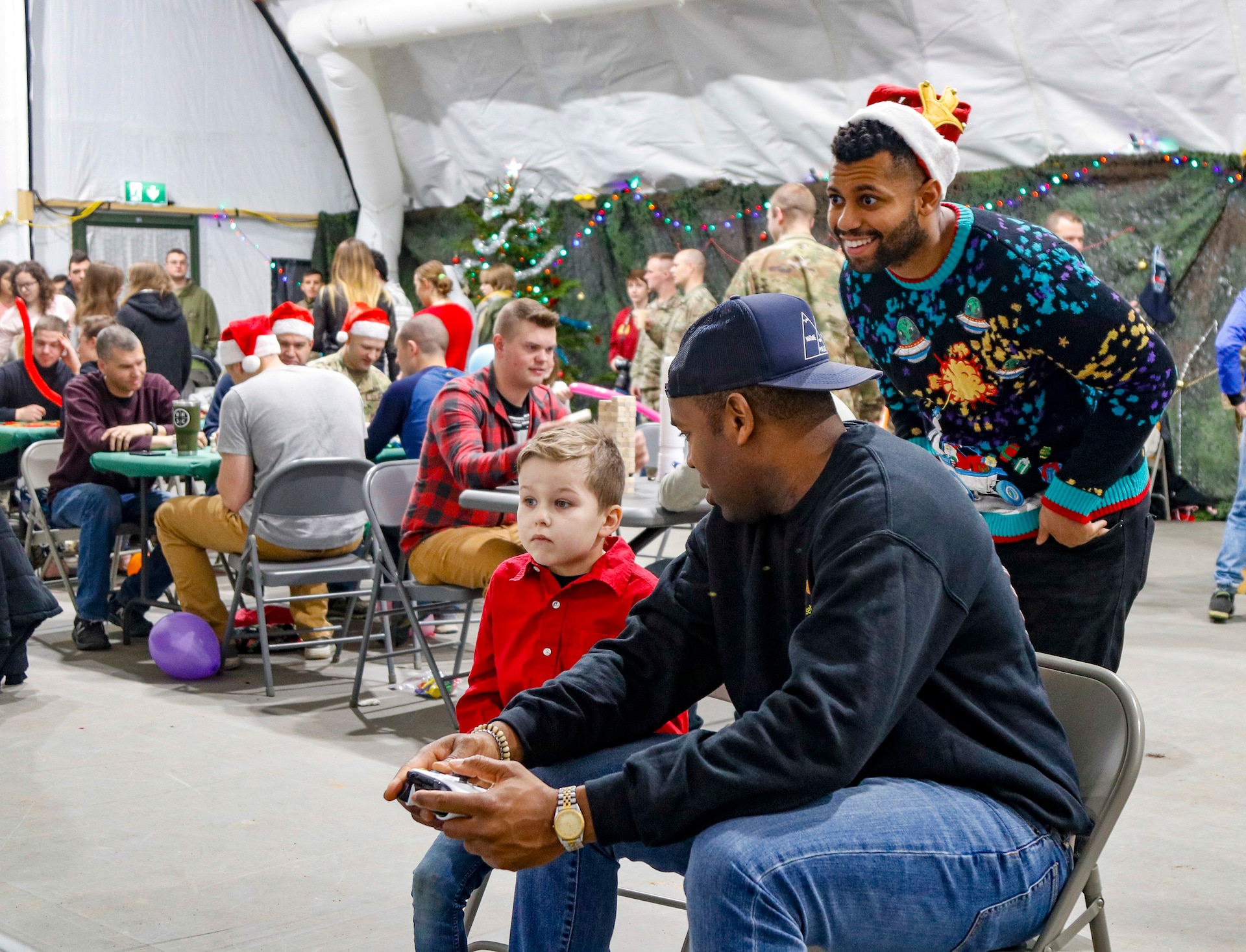NATO Soldiers give local children holiday cheer during “Operation Christmas”