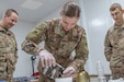 U.S. Army Spc. Shelby Vermeulen (center), with 1st Squadron, 303rd Cavalry Regiment, 96th Troop Command, Washington Army National Guard, works through the steps of water purification during a Field Sanitation Team Certification Course held from Dec. 9 to Dec.13, 2019 at Joint Training Center-Jordan. Soldiers must be ready and capable to conduct the full range of military operations to defeat all enemies regardless of the threats they pose. (U.S. Army photo by Shaiyla B. Hakeem)