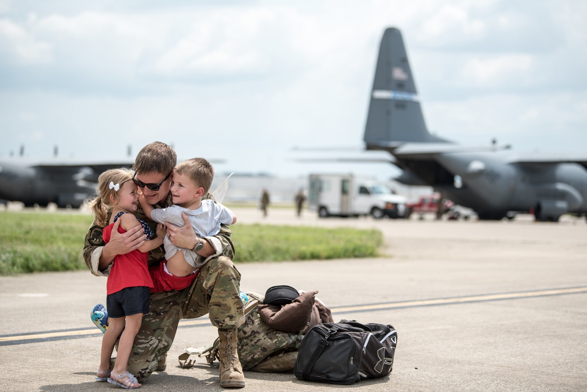 Master Sgt. Phil Speck, superintendent of the 123rd Airlift Wing Public Affairs Office, earned third place in the 2018 Air National Guard Military Photographer of the Year contest for a broad spectrum of work while deployed and at home station, including this photo of a deployment homecoming in Louisville, Ky., July 6, 2018. (U.S. Air National Guard photo by Master Sgt. Phil Speck)