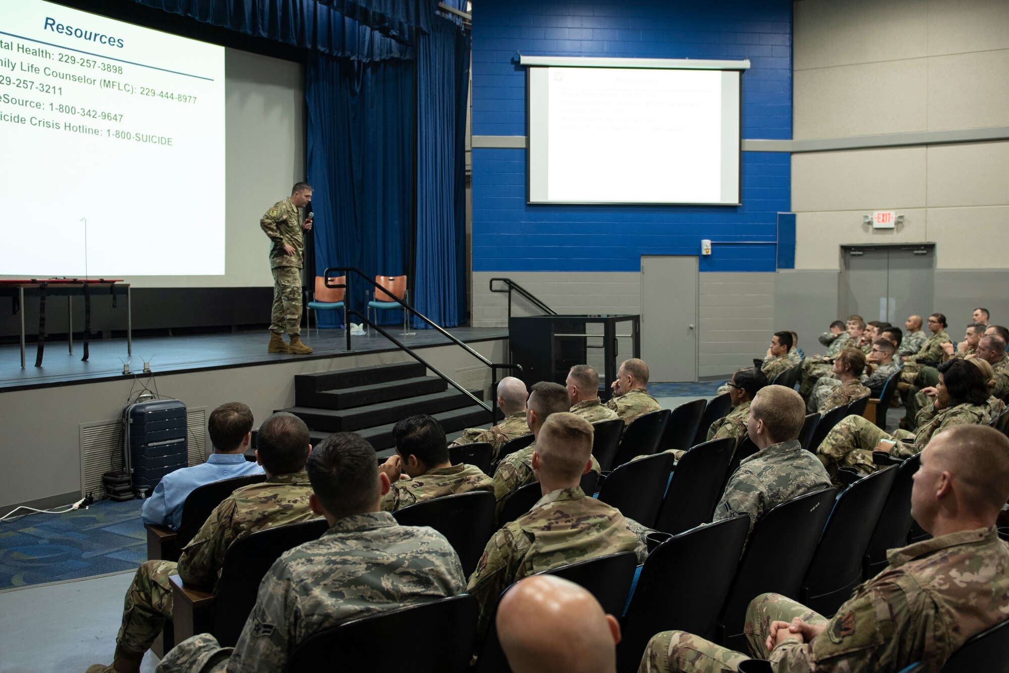 A photo of the 23d wing commander addressing Airmen