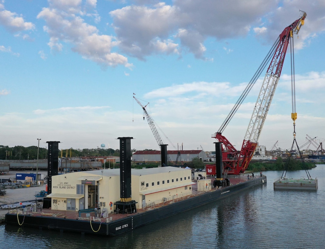 The U.S. Army Corps of Engineers' Marine Design Center managed the procurement of the Floating Crane "Quad Cities" on behalf of the USACE Rock Island District.