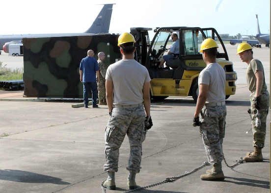 Airmen of the 752nd Operations Support Squadron unload the AN/TYQ-23A Tactical Air Operations Module weapons system as it arrives to Tinker Air Force Base in September 2019. The ground based weapons system allows squadron members at Tinker AFB to provide command and control to both live and simulated aircraft from around the country; being one of only four active duty bases to have this equipment.