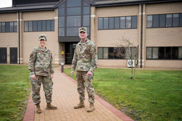 U.S. Air Force Lt. Col. Elizabeth Hoettels, 423rd Medical Squadron commander, and Lt. Col. Robert Heil, 422nd Medical Squadron commander, pose for a photo at the 423rd MDS clinic at RAF Alconbury, England, December 18, 2019. Hoettels and Heil share similar backgrounds in Army Special Forces and now serve as Air Force medical squadron commanders in the 501st Combat Support Wing. (U.S. Air Force photo by Airman 1st Class Jennifer Zima)
