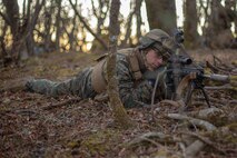 U.S. Marine Lance Cpl. Kael Grant secures a defensive fighting position for a company force on force event during exercise Fuji Viper 20-2 on Camp Fuji, Japan, Dec. 12, 2019. Fuji Viper is a regularly scheduled training evolution that allows infantry units to maintain their lethality and proficiency in infantry and combined arms tactics. This iteration of the exercise is executed by an activated reserve unit, 1st Battalion, 25th Marine Regiment, currently attached to 4th Marine Regiment, 3rd Marine Division, as part of the unit deployment program. Grant, a native of Rochester, N.Y., is an infantry rifleman. (U.S. Marine Corps photo by Lance Cpl. Ujian Gosun)