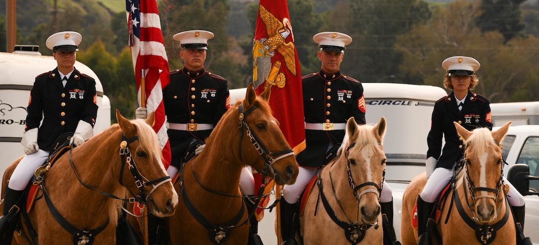 The Marine Corps Mounted Color Guard stand post during Equestfest in Burbank, California, Dec. 29.