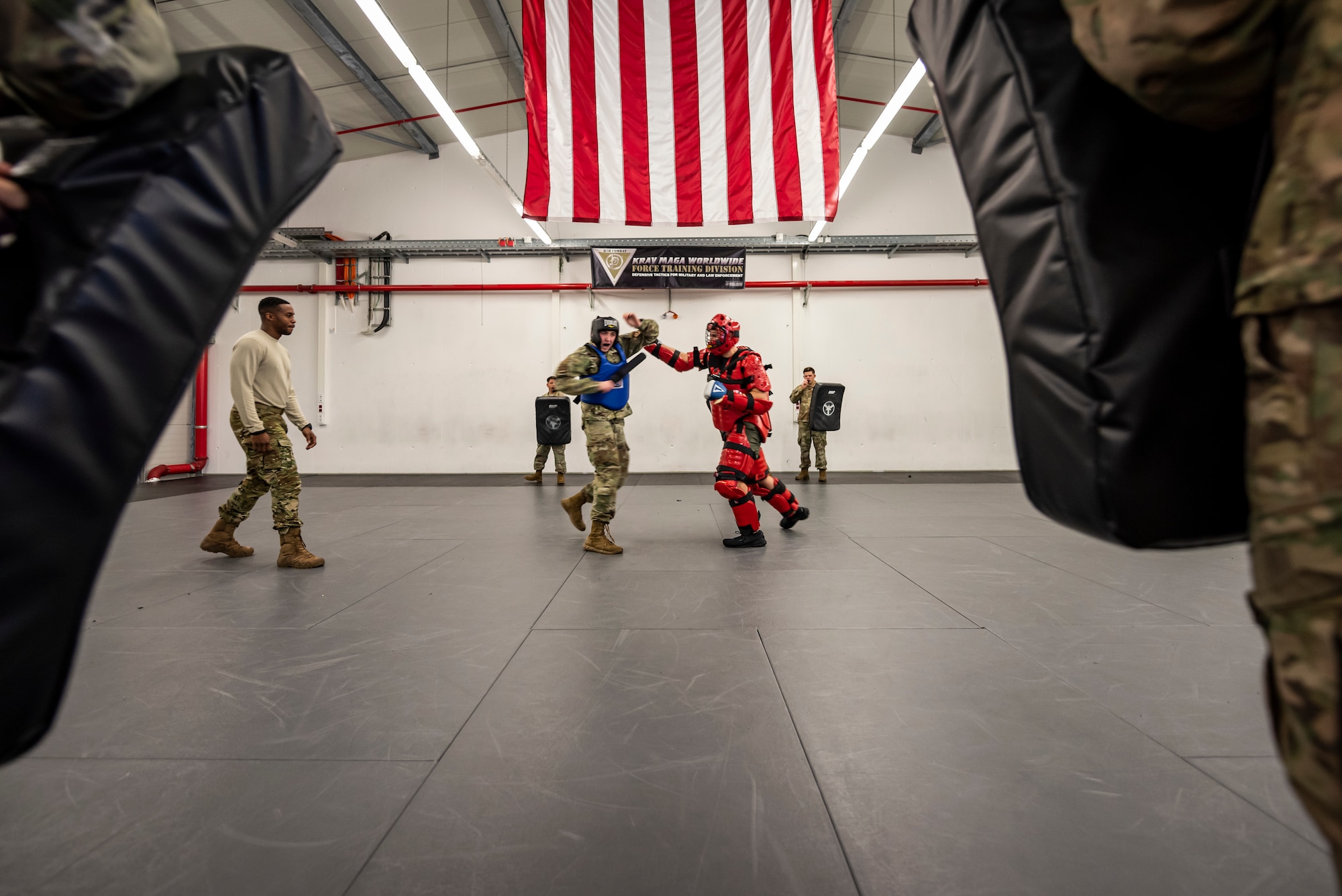 U.S. Air Force Airmen spar during a Leader Led Training Course at Ramstein Air Base, Germany, Dec. 7, 2019. Airmen sparred during the course to learn advanced fighting techniques and to learn how to teach those techniques within their home station flights. (U.S. Air Force photo by Staff Sgt. Devin Nothstine)