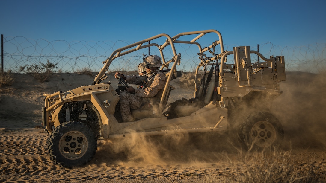 U.S. Marines drive a Utility Task Vehicle during a tactical vehicle driving course in Kuwait, Dec. 21.