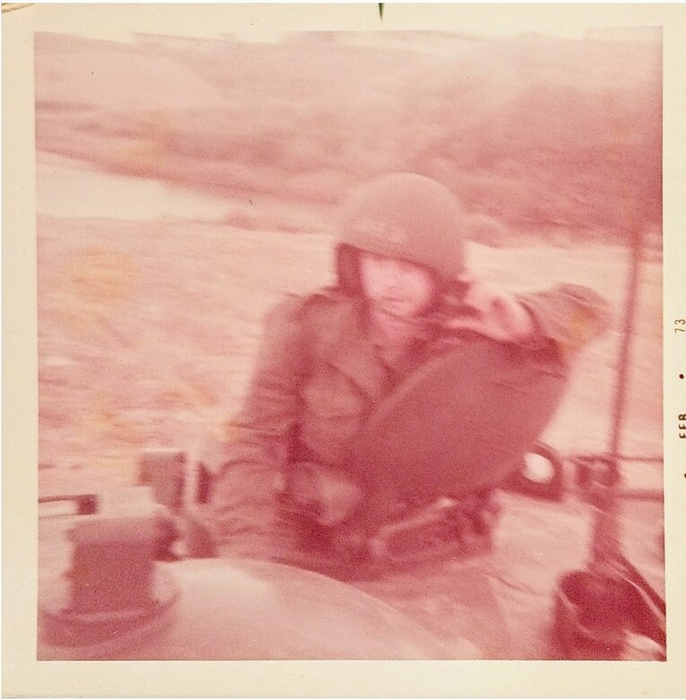 Then-Lance Cpl. Tommy “TJ” Pittman rides in a Landing Vehicle Tracked P5, one of many predecessors to the Corps’ upcoming Amphibious Combat Vehicle, in this photo from February 1973.  Pittman served the amphibious assault community for nearly 50 years, first as an enlisted amphibious vehicle operator for 24 years, then as a logistician with the Advanced Amphibious Assault program office at Program Executive Officer Land Systems for another 24 years. Pittman retired from federal civil service in December 2019. (Courtesy photo from Tommy Pittman)