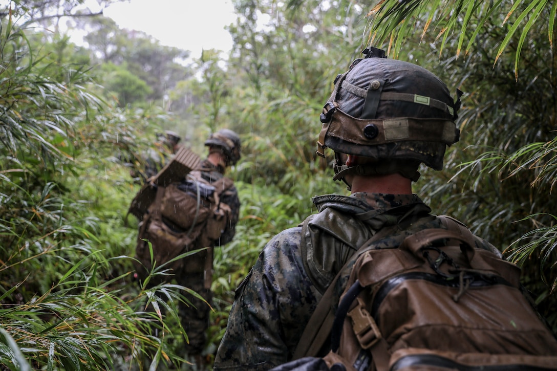 U.S. Marines conduct a reconnaissance patrol on Camp Hansen, Okinawa, Japan, Dec. 11.