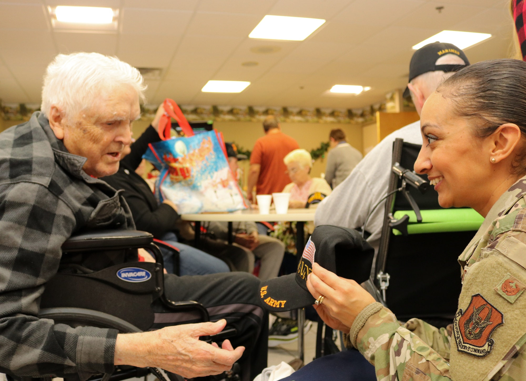 Members of the 507th Air Refueling Wing visited with veterans at the Norman Veteran's Center in Norman, Oklahoma, Dec. 20, 2019. (U.S. Air Force photo by Senior Airman Mary Begy)