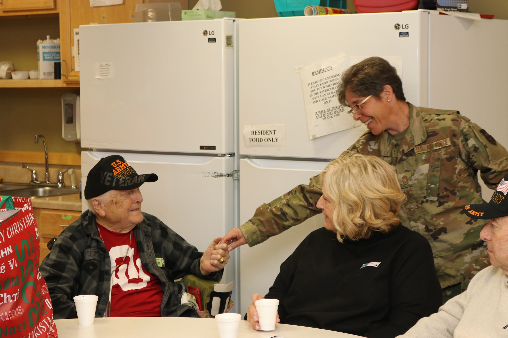 Members of the 507th Air Refueling Wing visited with veterans at the Norman Veteran's Center in Norman, Oklahoma, Dec. 20, 2019. (U.S. Air Force photo by Senior Airman Mary Begy)