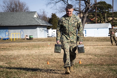 U.S. Marines with the Chemical Biological Incident Response Force (CBIRF) conduct a combat fitness test (CFT) aboard Naval Support Activity Indian Head, Maryland on Dec 20, 2019. Marines are required to run their CFT to test their overall fitness would be in a combat situation. (U.S. Marine Corps photo by SSgt Kristian Karsten/released)