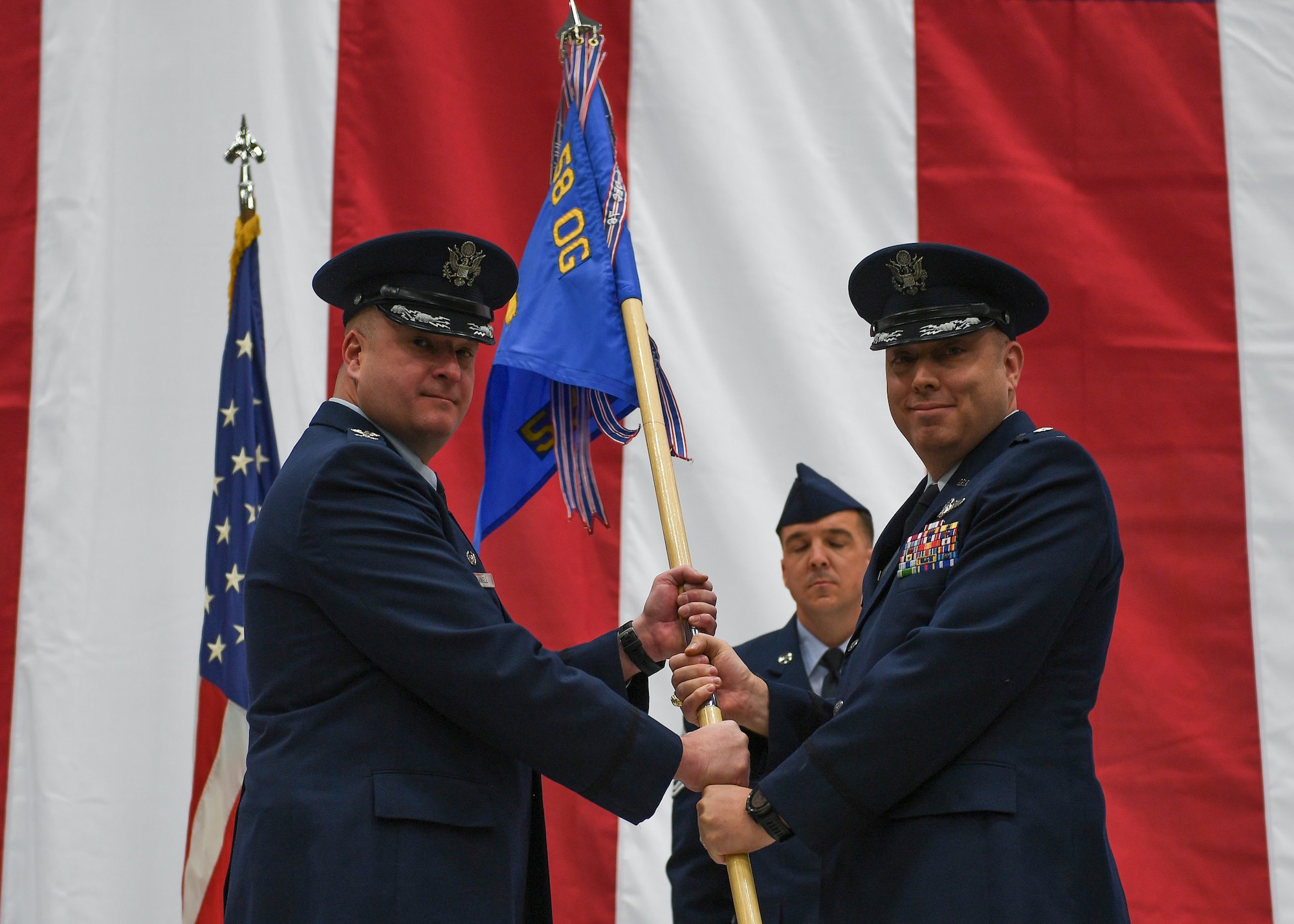 Passing of squadron flag during a change of command ceremony.