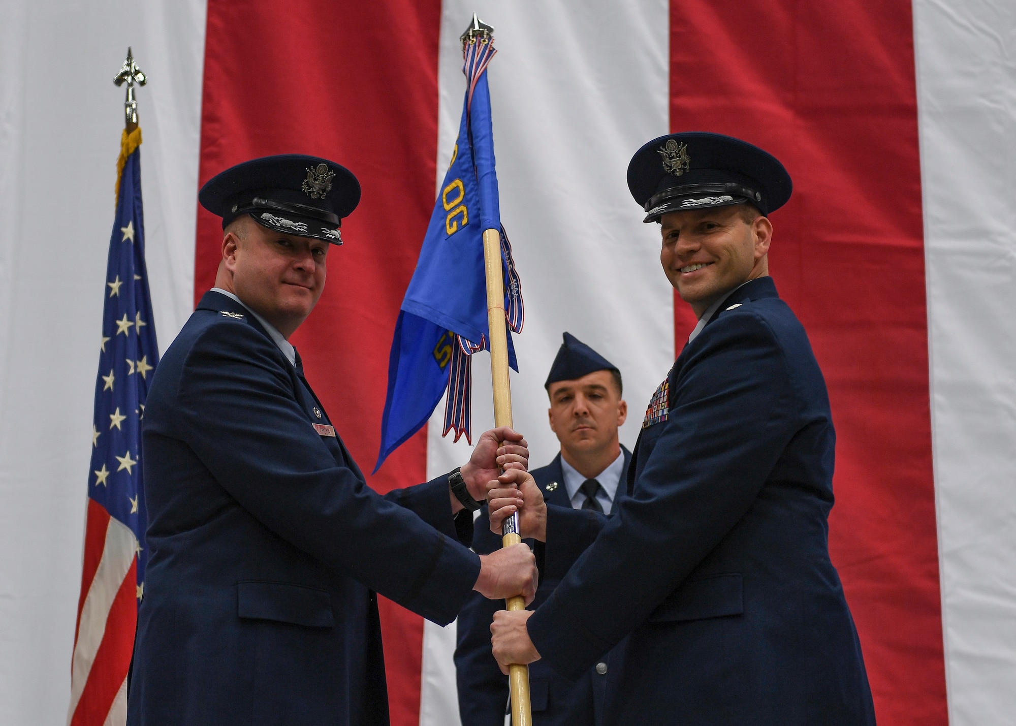 Passing of squadron flag during a change of command ceremony.