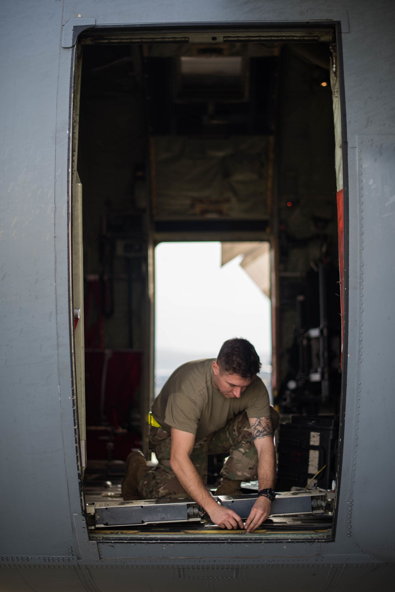 A U.S. Air Force Airman assigned to the 37th Airlift Squadron conducts maintenance on a C-130J Super Hercules aircraft during Exercise Agile Wolf at Ramstein Air Base, Germany, Dec. 17, 2019. A C-130J can carry 90 troops, or 40,000 pounds of cargo and provides U.S. Air Forces in Europe's only professional airlift to any country, any time in the European theater. (U.S. Air Force photo by Staff Sgt. Devin Nothstine)