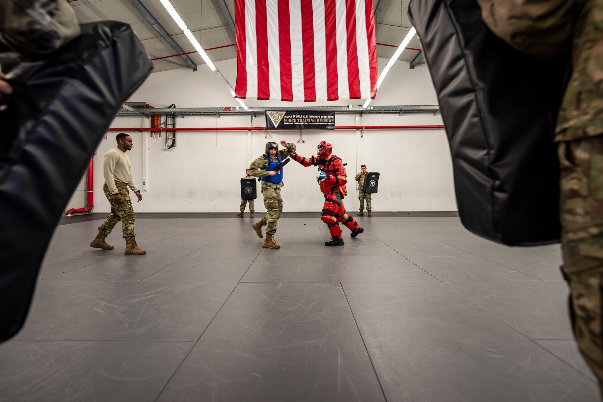 U.S. Air Force Airmen spar during a Leader Led Training Course at Ramstein Air Base, Germany, Dec. 7, 2019. Airmen sparred during the course to learn advanced fighting techniques and to learn how to teach those techniques within their home station flights. (U.S. Air Force photo by Staff Sgt. Devin Nothstine)