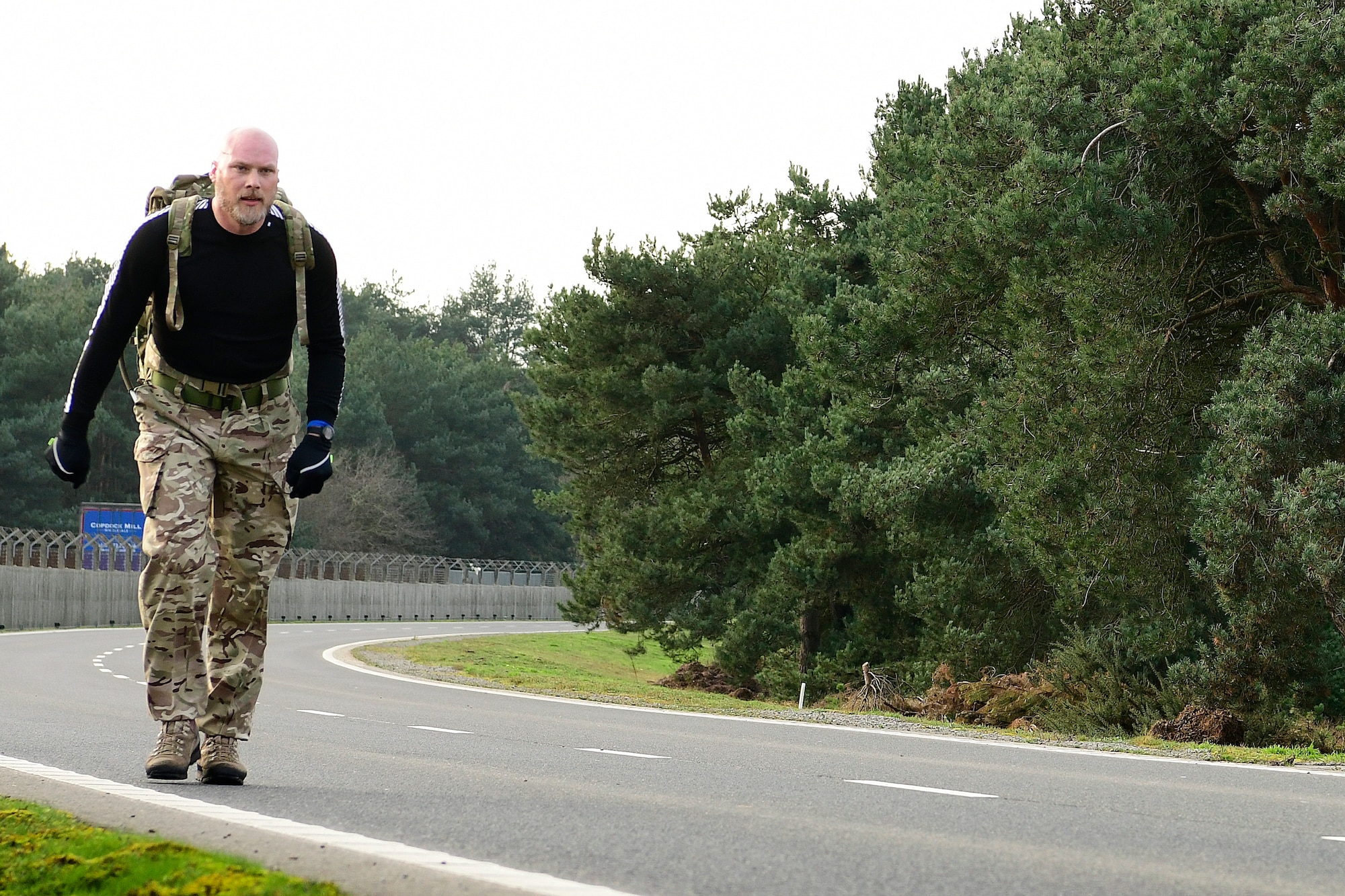 Barry Wall, Occupational Safety and former British Army infantryman,rucks eight miles carrying 56 lbs to raise funds and awareness in memory of the fallen 56th Rescue Squadron HH-60G Pave Hawk crew of Jolly-22, at Royal Air Force Lakenheath, England, Jan. 2, 2020. On Jan. 7, 2014, Capt. Sean Ruane, Capt. Christopher Stover, Tech. Sgt. Dale Mathews and Staff Sgt. Afton Ponce were killed when their helicopter crashed while performing a low-level training mission on the Norfolk coast. (U.S. Air Force photo/ Master Sgt. Matthew Plew)