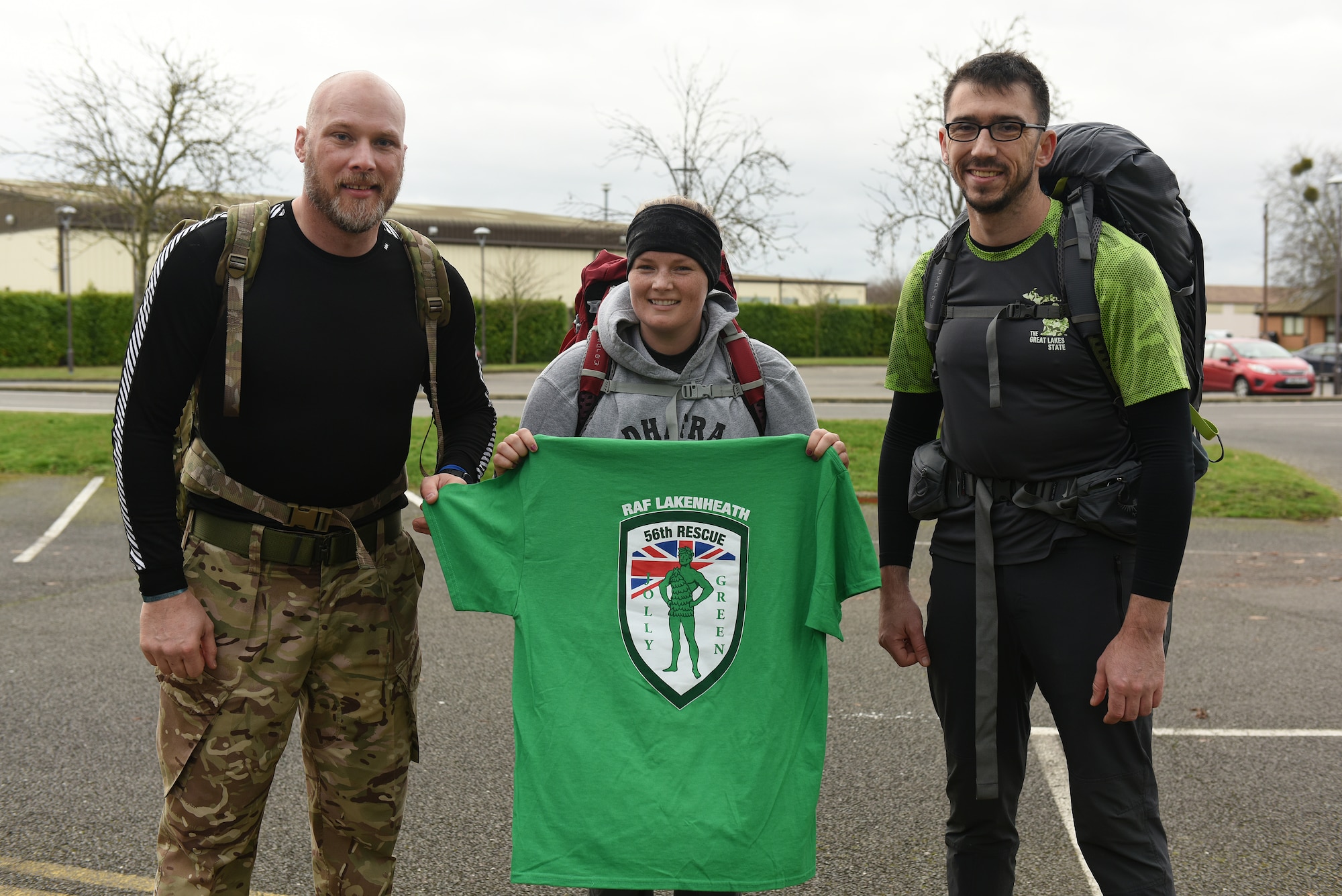 Barry Wall, Occupational Safety and former British Army infantryman, Tech. Sgt. Josh Rogers and Staff Sgt. Kacy Huddleston, Weapon Systems instructors assigned to the 372 Training Squadron Detachment 16 ruck eight miles carrying 56 lbs to raise funds and awareness in memory of the fallen 56th Rescue Squadron HH-60G Pave Hawk crew of Jolly-22, at Royal Air Force Lakenheath, England, Jan. 2, 2020. On Jan. 7, 2014, Capt. Sean Ruane, Capt. Christopher Stover, Tech. Sgt. Dale Mathews and Staff Sgt. Afton Ponce were killed when their helicopter crashed while performing a low-level training mission on the Norfolk coast. (U.S. Air Force photo/ Staff Sgt. Rachel Maxwell)