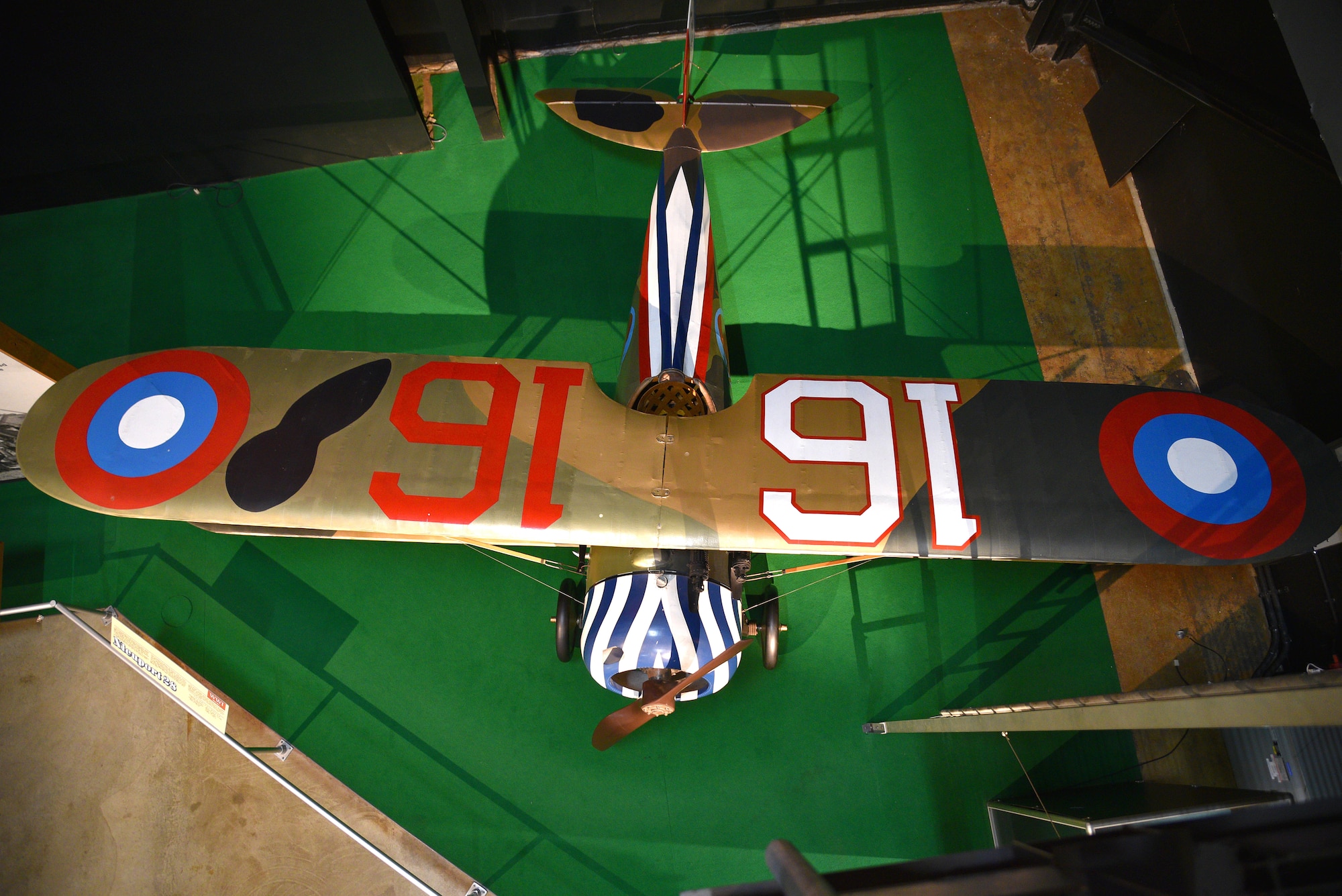 One early years aircraft on display. This is a fixed wing biplane that was driven by propellers. Nieuport N.28C-1