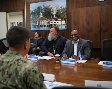 NSWC Corona Commanding Officer Capt. Khary Hembree-Bey (left) and HBCU/MI Program Director Anthony C. Smith Sr. discuss ways to enhance outreach and accession programs and increase workforce diversity.