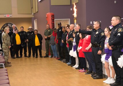 Law enforcement officers from Leon Valley Police Department, Bexar County Sheriff’s Office, Joint Base San Antonio-Fort Sam Houston’s 502nd Security Forces Squadron, Live Oak Police Department and the San Antonio Police Department led a law enforcement torch procession before the Summer Games press conference at Morgan’s Wonderland Event Center Dec. 10, 2019. Morgan’s Wonderland will host the Special Olympics Texas’ 51st Annual Summer Games, April 30 to May 3, 2020.