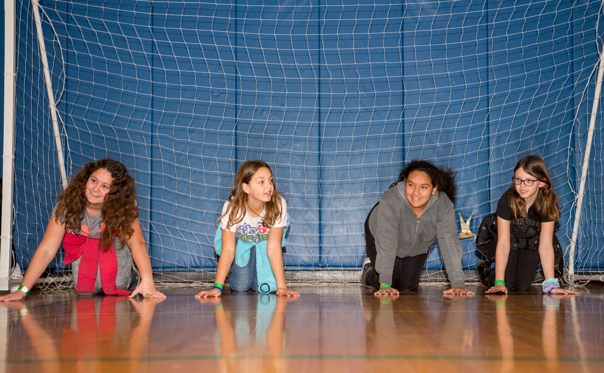 Students from Dysart Unified School District do push-ups during the Youth Center Winter Break Camp Dec. 31, 2019, at Luke Air Force base, Ariz.