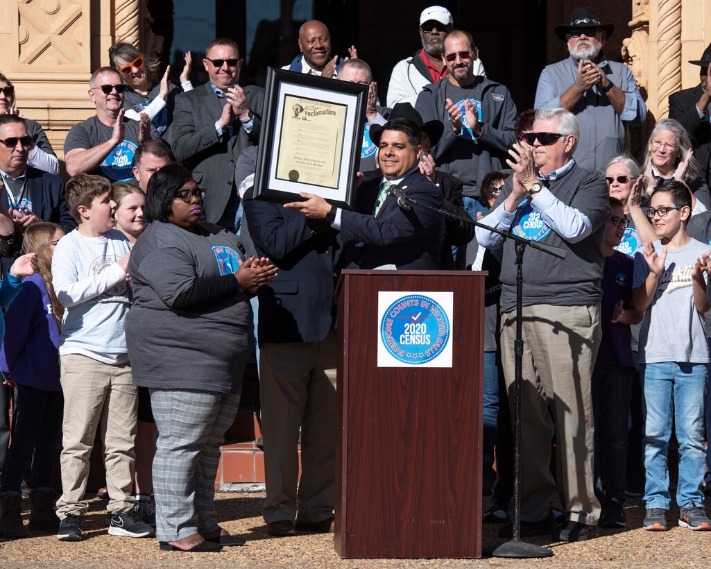 Wichita Falls' Mayor Stephen Santellana holds a proclamation at the 2020 Census launch event at the Memorial Auditorium in Wichita Falls, Texas, Jan. 7, 2020. Santellana said the census benefits communities across the country in a variety of ways. Be it for the city, for the arts, school districts or for the military community in Wichita Falls, he said the census will benefit all if we participate and show that we are here. (U.S. Air Force photo by Senior Airman Pedro Tenorio)