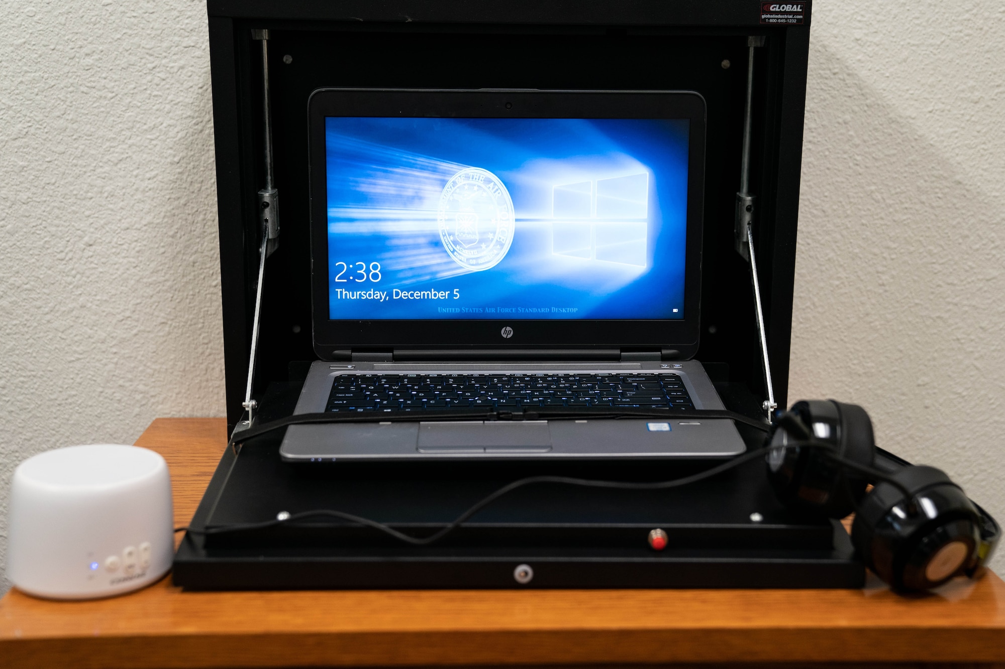 Maj. Michael Vernale, Mental Health Flight commander, displays the equipment for future video medical care offered at each missile alert facility at the F.E. Warren Air Force Base Clinic, Wyoming, Dec. 18, 2019. The equipment will be in a private room with soundproofing, video-enabled laptop and headphones. Vernale worked with the 90th Missile Wing LaunchWERX agency to launch the idea as part of an ongoing effort to innovate the Air Force to meet the demands of tomorrow. The plan is to install the capability in each missile alert facility. (U.S. Air Force photo by Joseph Coslett)