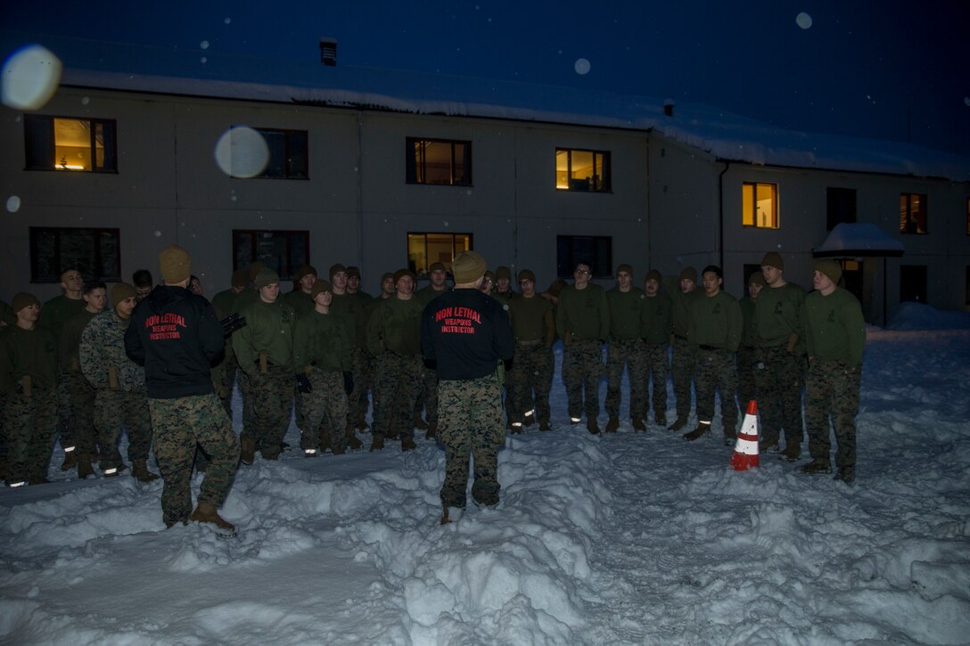 U.S. Marines with Marine Rotational Force-Europe 20.1, Marine Forces Europe and Africa, receive a safety brief during a level-one oleoresin capsicum spray class in Setermoen, Norway, Dec. 18, 2019. During the training, Marines are exposed to OC spray and then conduct law enforcement scenarios and practice the lawful use of force. MRF-E focuses on regional engagements throughout Europe by conducting various exercises, arctic cold-weather and mountain-warfare training, and military-to-military engagements, which enhance overall interoperability of the U.S. Marine Corps with allies and partners. (U.S. Marine Corps photo by Sgt. Justin X. Toledo)