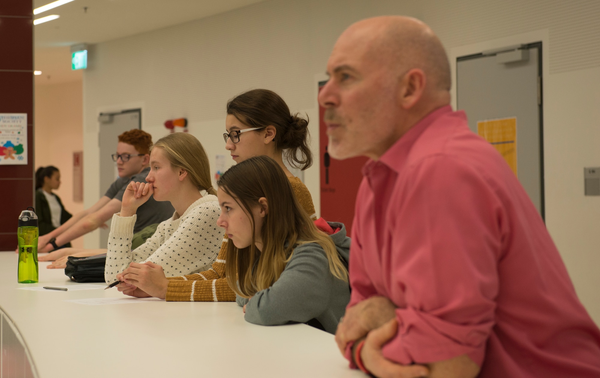 Ken Robinson, Kaiserslautern High School teacher, and KHS students listen to a presentation hosted by the Air Force Association and KHS Science, Technology, Engineering at Kapaun Air Station, Germany, Dec. 16, 2020. The local Kaiserslautern chapter of the AFA, a non-profit organization, supports aerospace education for KHS students through sponsorships and participation in their Junior Reserve Officers’ Training Corps.