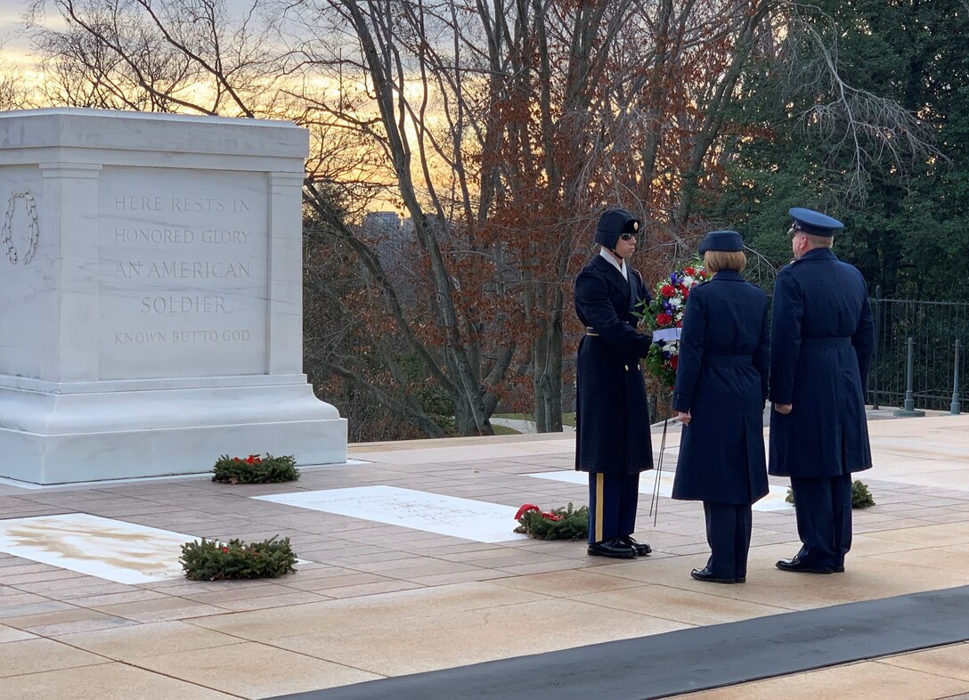 Air Force Office of Special Investigations Commander Brig. Gen. Terry L. Bullard and Command Chief Master Sgt. Karen F. Beirne-Flint present the AFOSI wreath to a member of the 3rd U.S. Infantry Regiment (The Old Guard) for placement at the Tomb of the Unknown Soldier at Arlington National Cemetery, Va., Jan. 7, 2020. (Photo by SA Spencer King)
