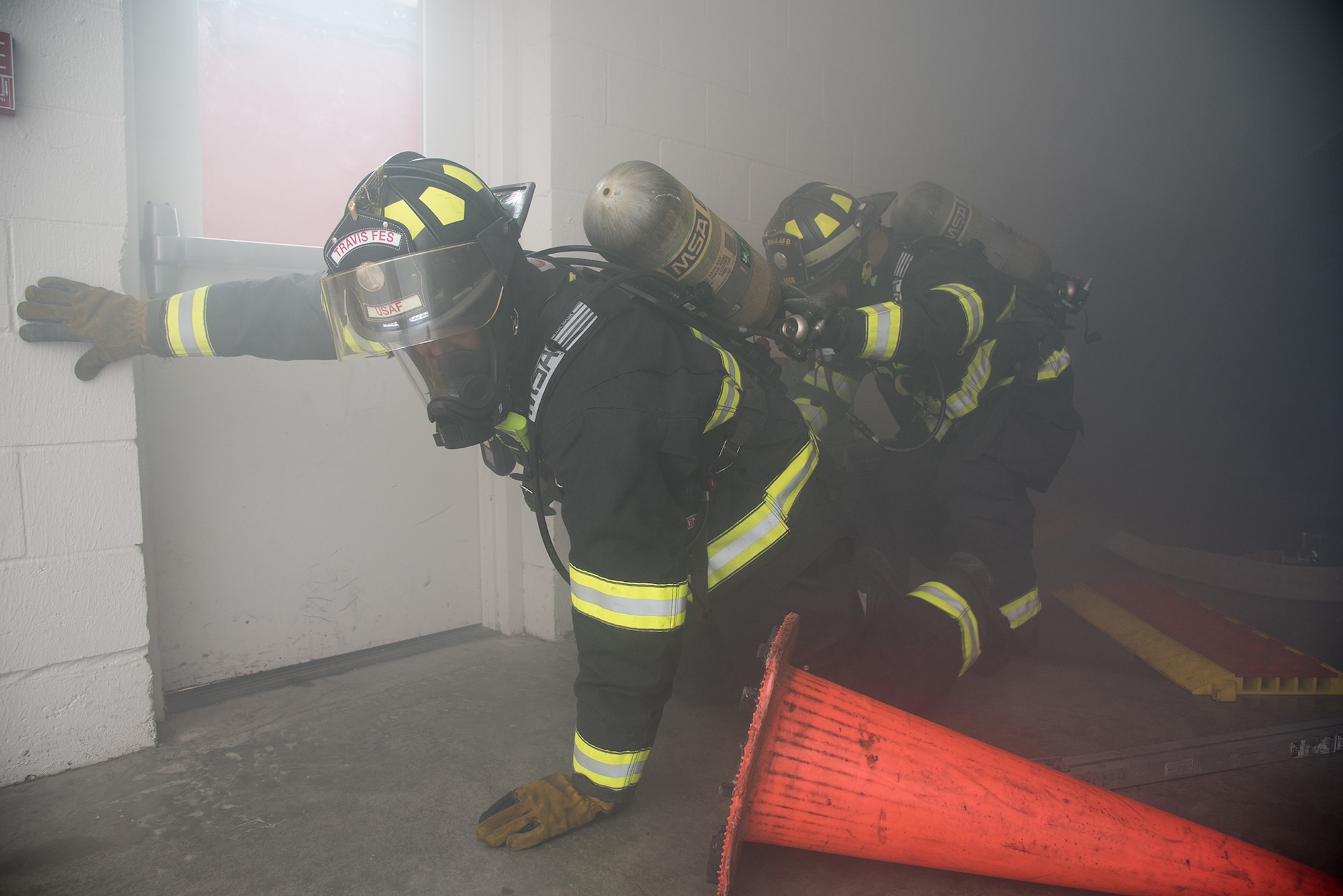 Airmen trained on search and rescue tactics with the use of personal protective equipment and various tools.