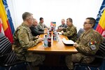 Vice Chairman of the Joint Chiefs of Staff Gen. John E. Hyten meets with Romanian Chief of the Defense Staff Lt. Gen. Daniel Petrescu during a visit to Mihail Kognalniceanu Air Base, Romania, as part of the Chairman's USO New Year's Tour 2020, on Jan. 7, 2020.