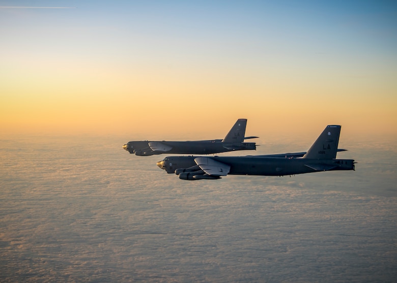 Two B-52H Stratofortress aircraft assigned to the 96th Bomb Squadron fly in formation