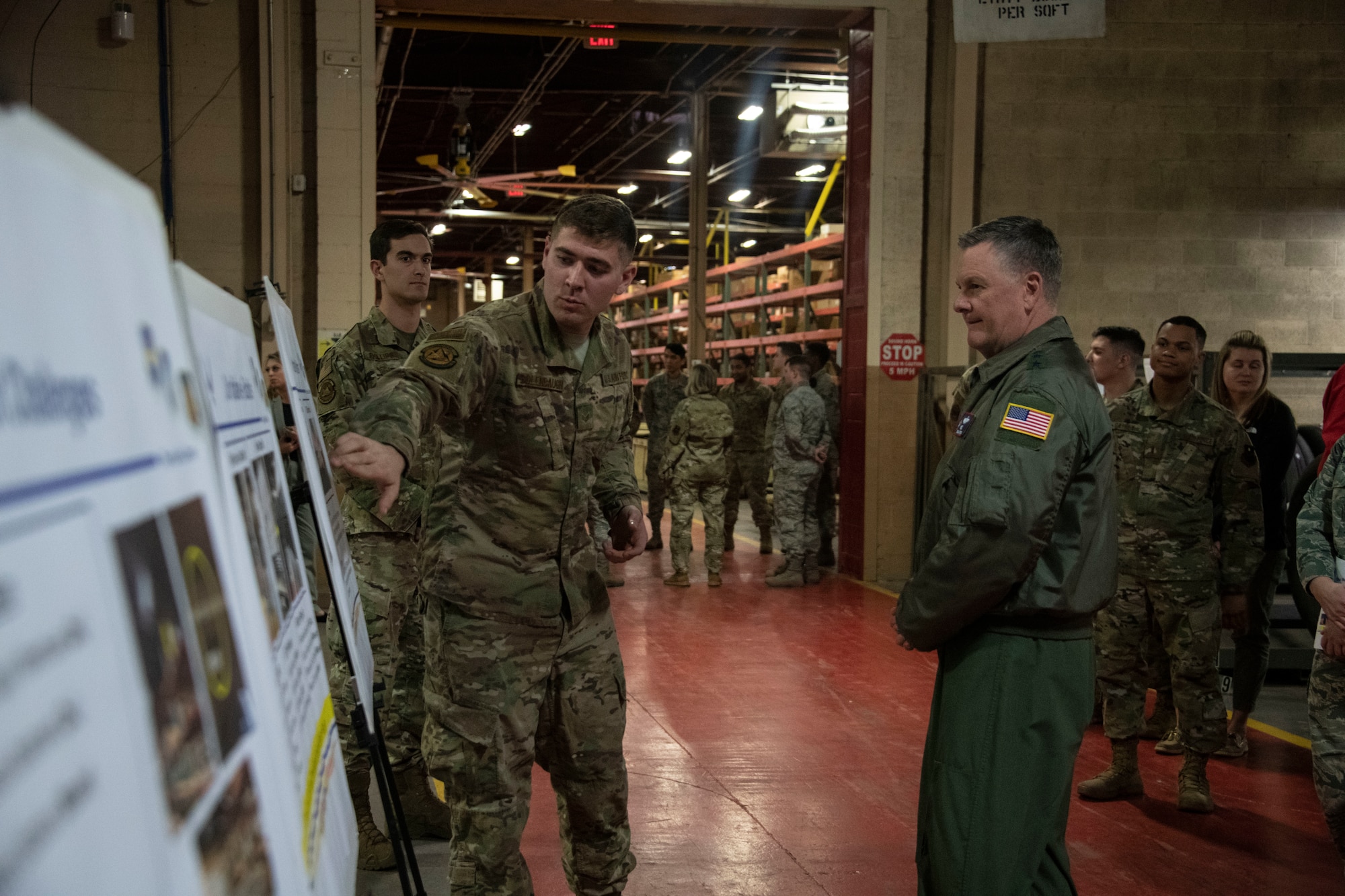 U.S. Air Force Lt. Gen. Brad Webb, commander of Air Education and Training Command, learns more about initiatives happening throughout the 97th Logistics Readiness Squadron.
