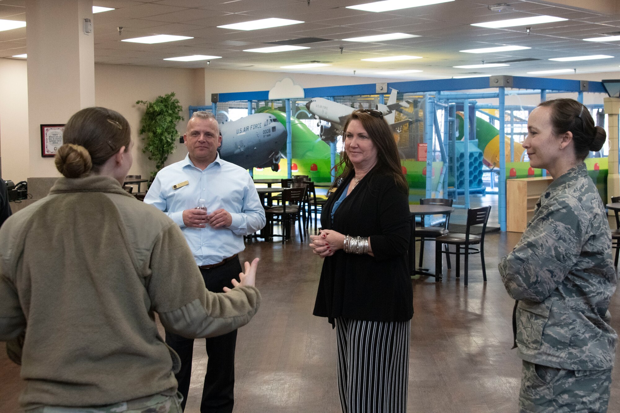Dawna Webb, spouse of Lt. Gen. Brad Webb, commander of Air Education and Training Command, and Robb Gudgel, spouse of Chief Master Sgt. Julie Gudgel, command chief of AETC, are shown the Freedom Community Center and the quality of life improvements made through the 97th Force Support Squadron.