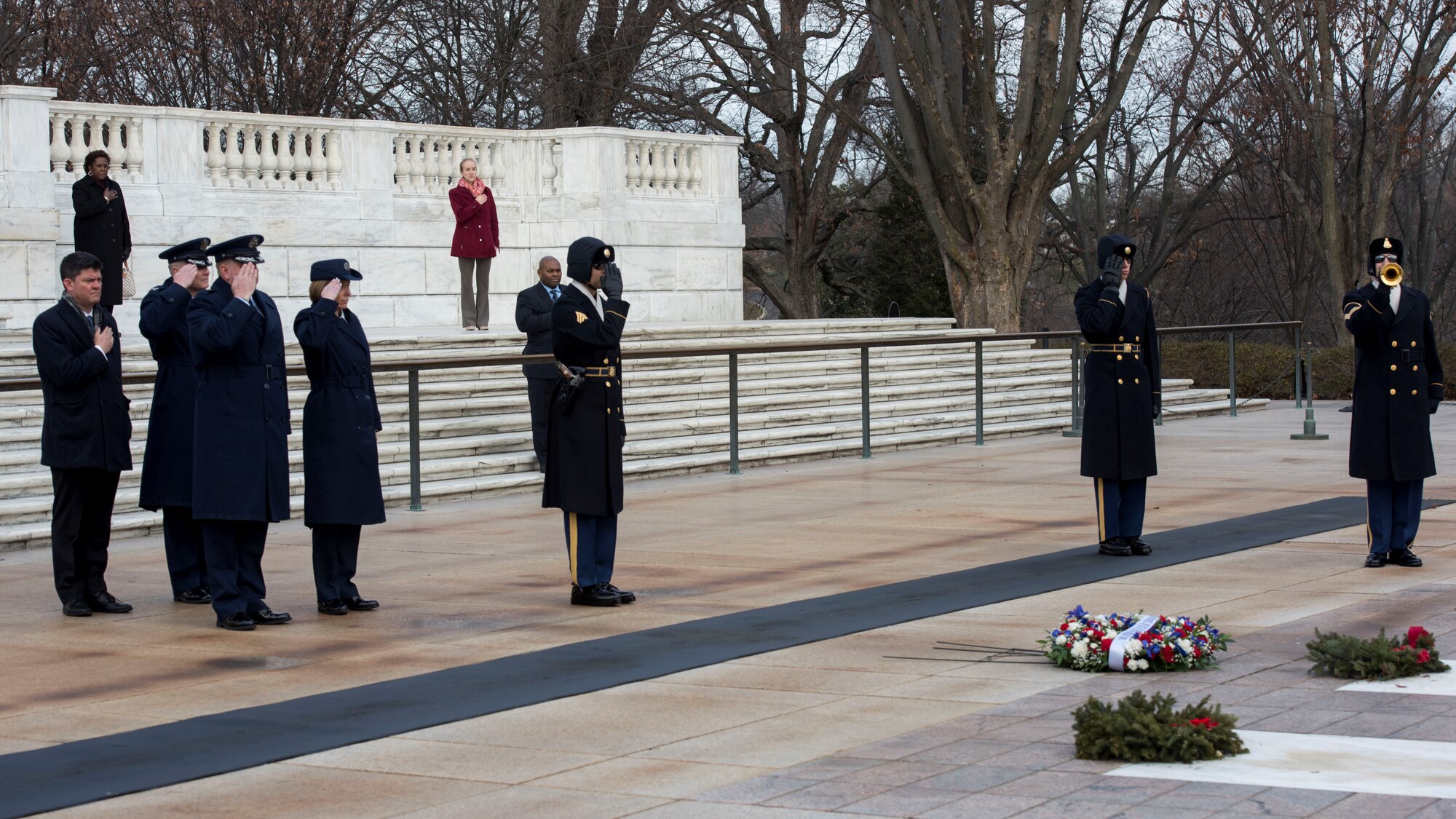 Air Force Office of Special Investigations Headquarters leadership, left, render honors with members of the 3rd U.S. Infantry Regiment (The Old Guard) during the laying of the AFOSI wreath at the Tomb of the Unknown Soldier at Arlington National Cemetery, Va., Jan. 7, 2020. (U.S. Air Force photo by Staff Sgt. Jeremy Mosier, SAF/PAI)